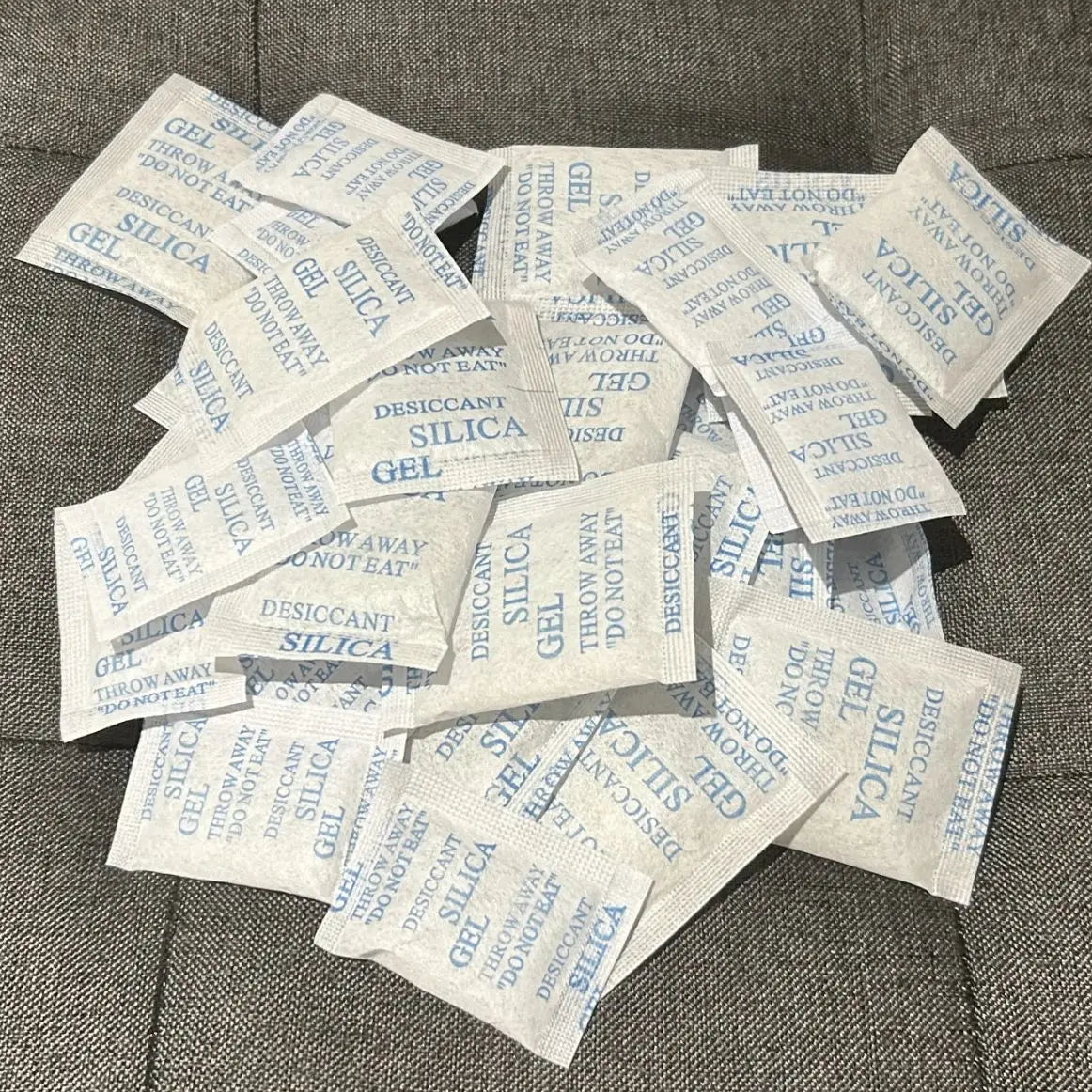 1G 50/100/200/500 Packs Non Toxic Nonwovens Silica Gel Desiccant Damp Kitchen Room Living Moisture Dehumidifier Absorber Bag